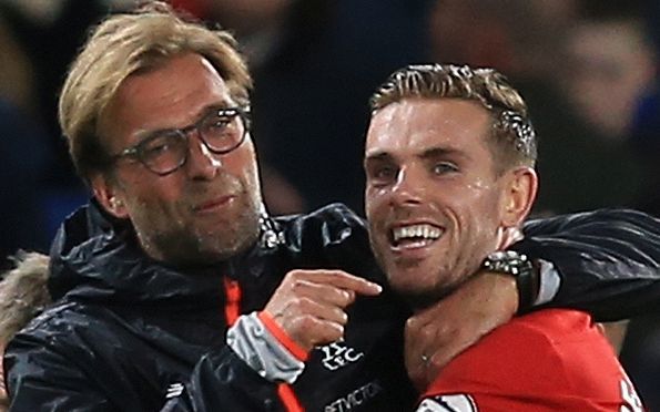 Jurgen Klopp manager of Liverpool celebrates with Jordan Henderson