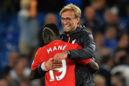 Jurgen Klopp celebrates with Liverpool's Sadio Mane