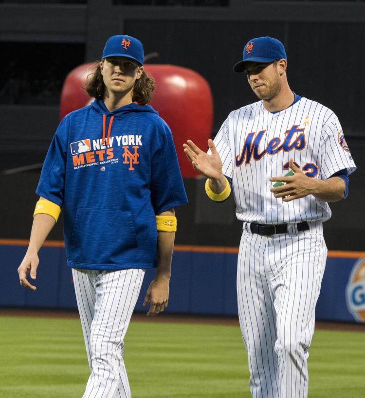 Just a pair of hurting Mets starters Jacob de Grom talks with Steven Matz Friday