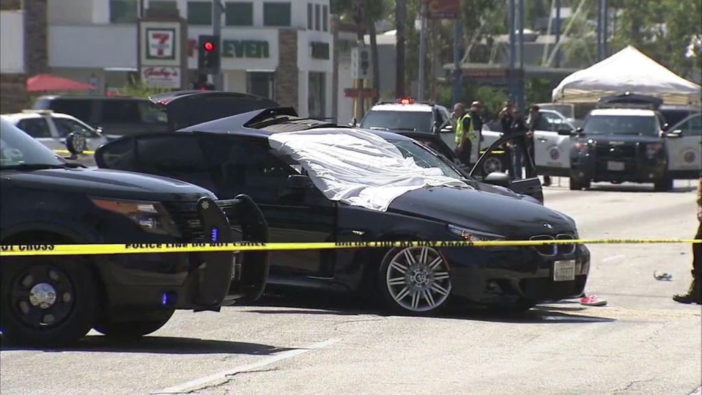 A father was killed and his 8-year-old son was injured when their BMW sedan was struck by a stolen car in Culver City police said