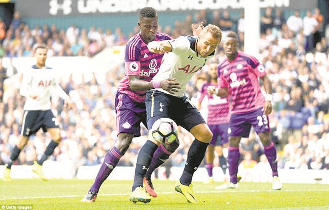 Kane strike sends Tottenham third