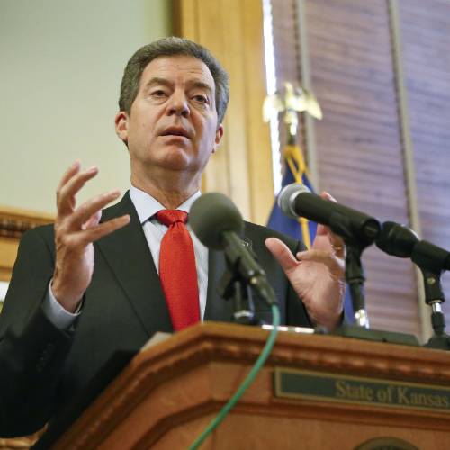 Sam Brownback announces that his administration is working on a new education funding system proposal and calls on leaders in Kansas and the education community to assist in developing the proposal during a press conference Wednesday