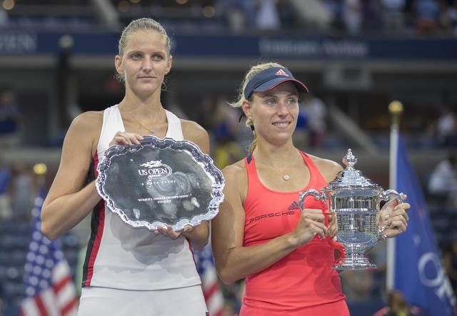 Karolina Pliskova and Angelique Kerber pose with their trophies during the post-match presentation ceremony