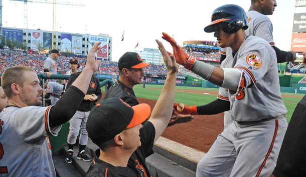 Aug 24 2016 Washington DC USA Baltimore Orioles third baseman Manny Machado is congratulated by teammates after hitting a two run homer against the Washington Nationals during the first inning at Nationals Park