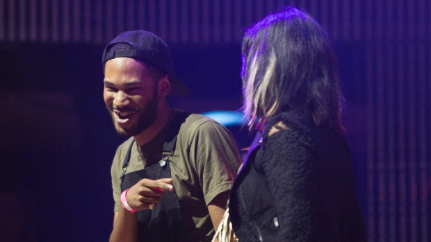 Kaytranada left is congratulated by Buffy Sainte Marie after being awarded the 2016 Polaris Music Prize in Toronto