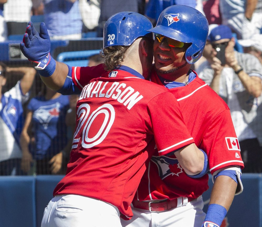 Upton's inside-the-park homer leads Blue Jays to 8-7 win over Twins