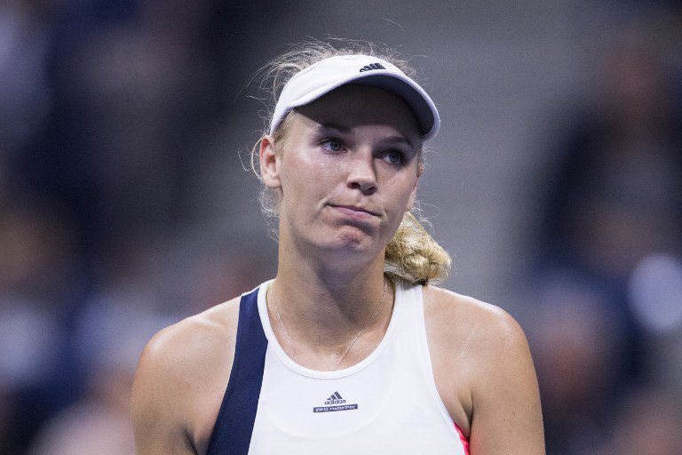 Caroline Wozniacki of Denmark reacts after losing a point against Anastasija Sevastova of Latvia during their 2016 US Open Women's Singles match at the USTA Billie Jean King National Tennis Center in New York