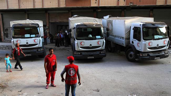 Aid trucks for Syria wait in no-man's land on Turkish border