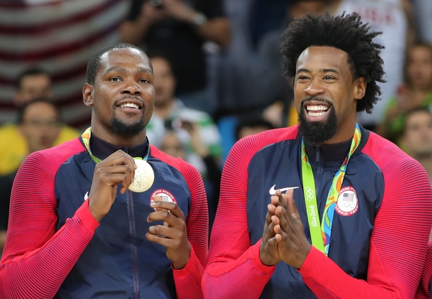 Kevin Durant and De Andre Jordan from USA basketball team show off their gold medals at Rio Olympics