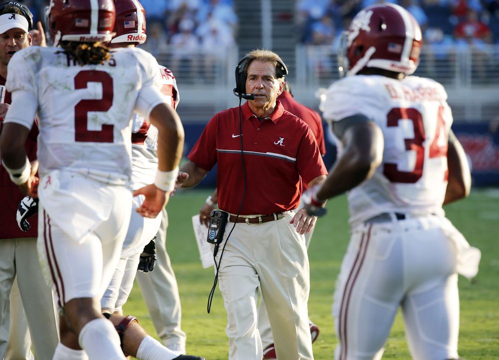 Alabama head coach Nick Saban center calls to his players following a touchdown against Mississippi in the second half of an NCAA college football game Saturday Sept. 17 2016 in Oxford Miss