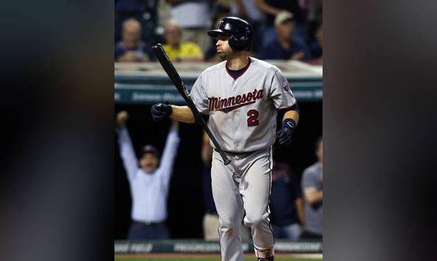 Minnesota Twins&#039 Brian Dozier reacts after striking out against Cleveland Indians relief pitcher Bryan Shaw to end a baseball game Wednesday Aug. 31 2016 in Cleveland. The Indians won 8-4