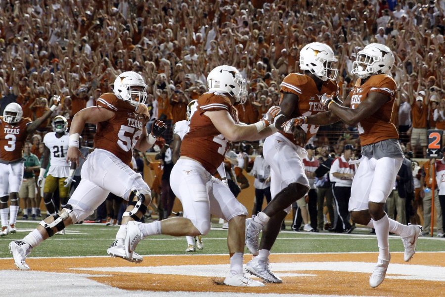 Soobum Im  USA TODAY Sports Texas Longhorns quarterback Tyrone Swoopes scores the winning touchdown in overtime Sunday against the Notre Dame Fighting Irish at Darrell K Royal Texas Memorial Stadium