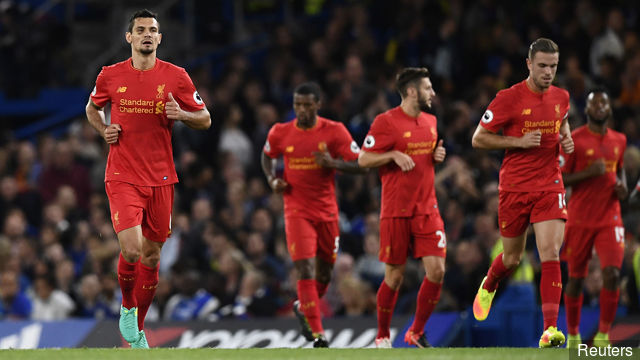 Liverpool's Dejan Lovren celebrates scoring their first goal