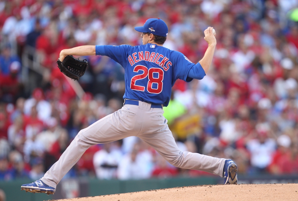 Chicago Cubs starting pitcher Kyle Hendricks delivers a pitch to the St. Louis Cardinals in the first inning of Game 2 of the National League Division Series at Busch Stadium in St. Louis