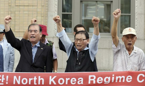 LEE JIN-MAN							Credit AP				Protesters of North Korea’s latest nuclear test shout slogans during a rally Monday in Seoul South Korea