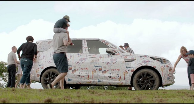 Land Rover teases Discovery camo scrawled by children