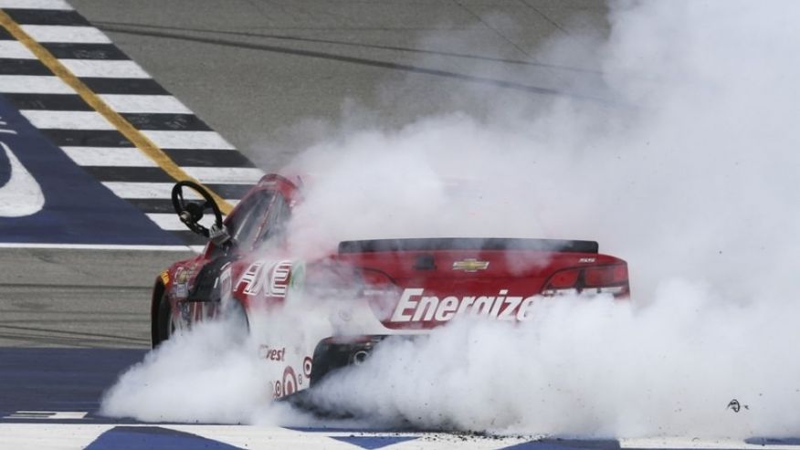 Aug 28 2016 Brooklyn MI USA Sprint Cup Series driver Kyle Larson celebrates winning the Pure Michigan 400 at the Michigan International Speedway. Mandatory Credit Aaron Doster-USA TODAY Sports