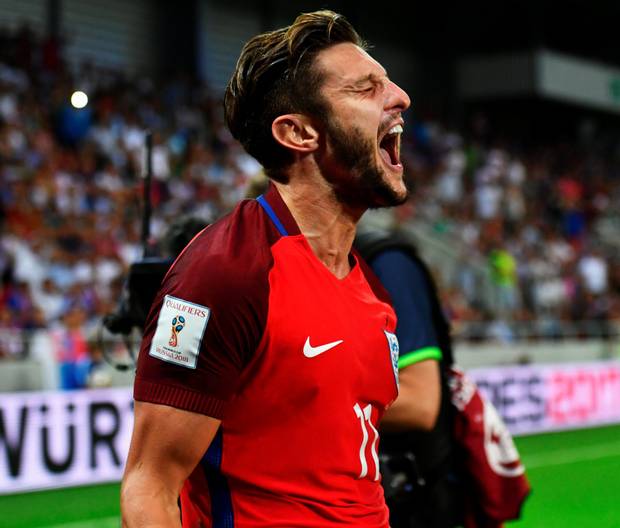 Late joy Adam Lallana celebrates after scoring England’s 95th minute winner against Slovakia