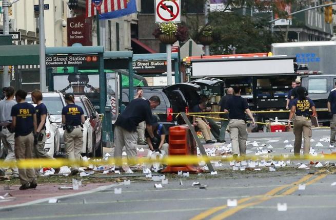 Law Enforcement Officers are seen at the scene of an explosion on West 23rd Street September 18 2016 in New York