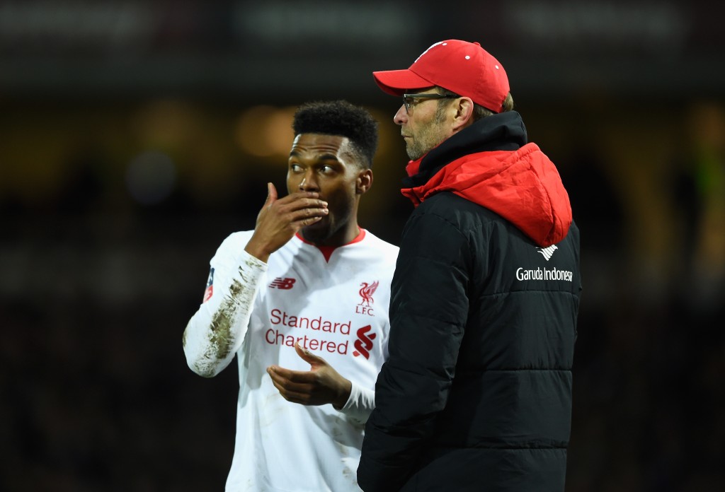 LONDON ENGLAND- FEBRUARY 09 Jurgen Klopp manager of Liverpool talks to Daniel Sturridge of Liverpool during the Emirates FA Cup Fourth Round Replay match between West Ham United and Liverpool at Boleyn Ground