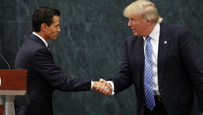 Mexico President Enrique Pena Nieto and Republican presidential nominee Donald Trump shake hands after a joint statement at Los Pinos the presidential official residence in Mexico City Wednesday Aug. 31 2016. Trump is calling his surprise visit to Me