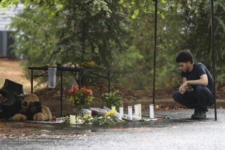 A visitor was seen at a makeshift memorial for Keith Scott