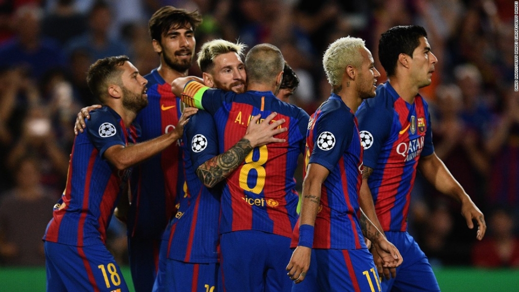 Lionel Messi celebrates one of his three goals as Barcelona recorded its largest Champions League victory when thrashing Celtic 7-0 at Camp Nou