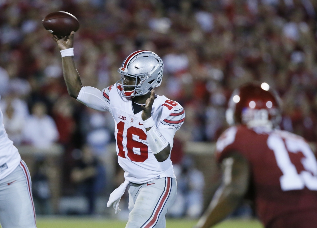 Ohio State quarterback J.T. Barrett passes during the second quarter of an NCAA college football game against Oklahoma in Norman Okla. Saturday Sept. 17 2016