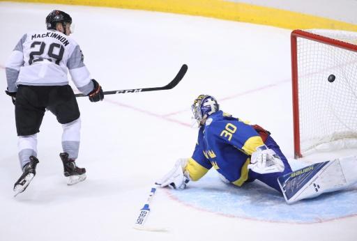 MacKinnon scores OT winner Swedes win group at World Cup of Hockey