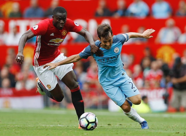 Manchester City's David Silva in action with Manchester United's Eric Bailly. Reuters