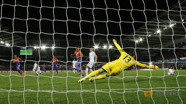 Man City march on with League Cup win over Swansea