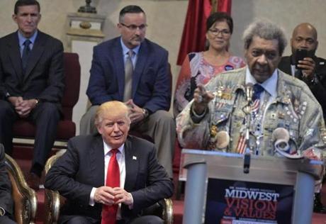 Republican presidential nominee Donald Trump is introduced by boxing promoter Don King at the Midwest Vision and Values Pastors and Leadership Conference at the New Spirit Revival Center in Cleveland Heights Ohio