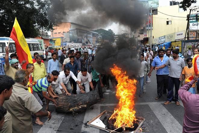 Mandya Kannada people holding a protest over Cauvery water row in Mandya district on Monday. PTI