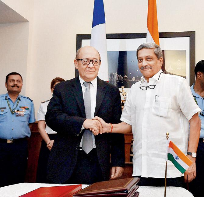 Manohar Parrikar and Jean Yves Le Drian. Pic  PTI