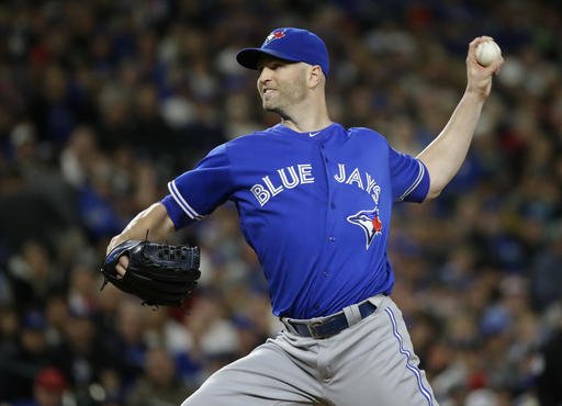 Toronto Blue Jays starting pitcher J.A. Happ throws against the Seattle Mariners in the second inning of a baseball game Tuesday Sept. 20 2016 in Seattle