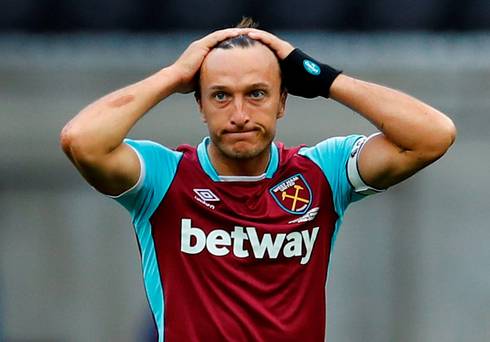 Mark Noble shows his dejection at West Ham’s performance