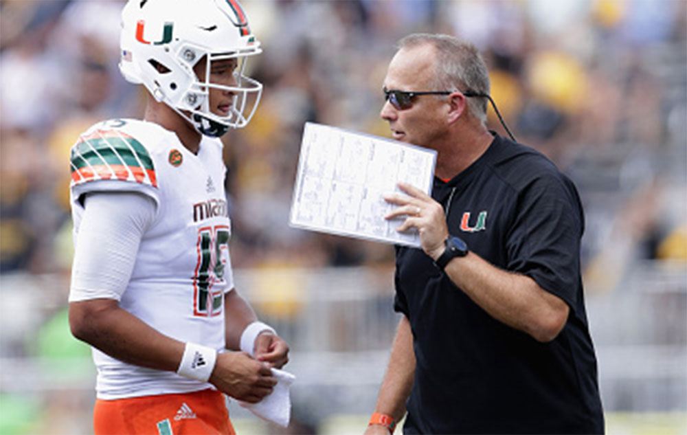 Mark Richt talks to Brad Kaaya during Miami's 45-10 win over Appalachian State