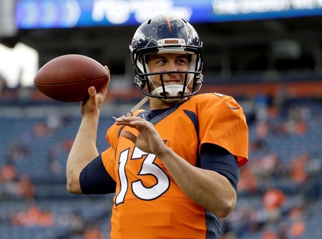 Denver Broncos quarterback Trevor Siemian warms up prior to an NFL preseason football game against the Los Angeles Rams in Denver. Siemian is Peyton Manning's successor. Coach Gary Kubiak told the team M