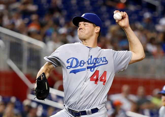 Los Angeles Dodgers&#39 Rich Hill delivers a pitch during the first inning of a baseball game against the Miami Marlins Saturday Sept. 10 2016 in Miami