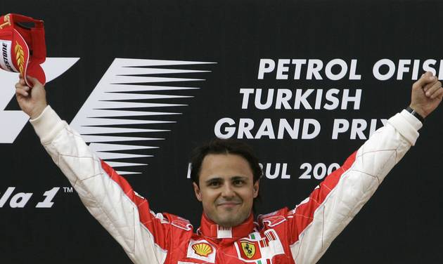 Ferrari Formula One driver Felipe Massa of Brazil celebrates on the podium after winning the Turkish Formula One Grand Prix at the Istanbul Park circuit in Istanbul Turkey. Massa has announced he will retir