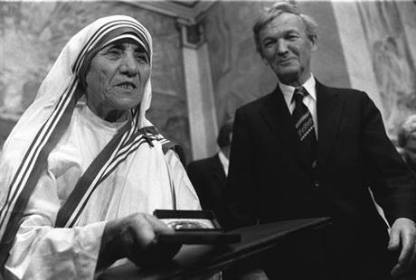 Mother Teresa receives the Nobel Peace Prize during a ceremony at Oslo University. At right is the Chairman of the Norwegian Nobel Committee Professor John Sanness. With Sunday Sept. 4 2016 making the canonizati