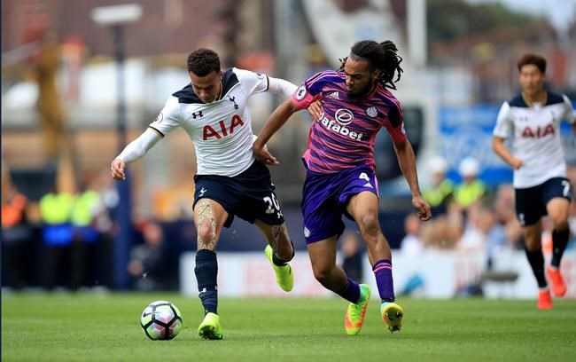 Sunderland's Jason Denayer right and Tottenham Hotspur's Dele Alli in action during their English Premier League soccer match at White Hart Lane in London Sunday Sept. 18 2016