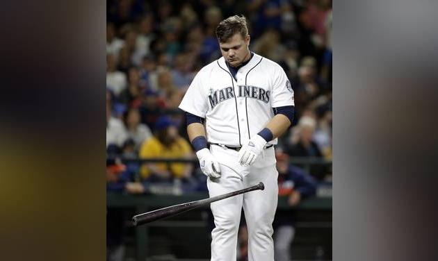 Seattle Mariners&#039 Dan Vogelbach drops his bat after striking out against the Houston Astros to end the fifth inning of a baseball game Friday Sept. 16 2016 in Seattle