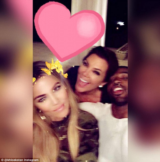 Meet the parents! Khloe's mother Kris Jenner poses with her daughter and her new boyfriend Tristan Thompson