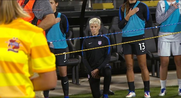 Megan Rapinoe continues her protest from the Team USA sidelines