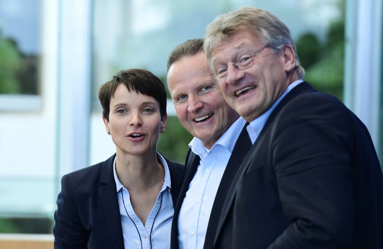 Leaders of the 'Alternative fuer Deutschland&#039  Frauke Petry and Joerg Meuthen and AFD's top-candidate for Berlin Georg Pazderski arrive for a press conference one day after regional elections in Berlin