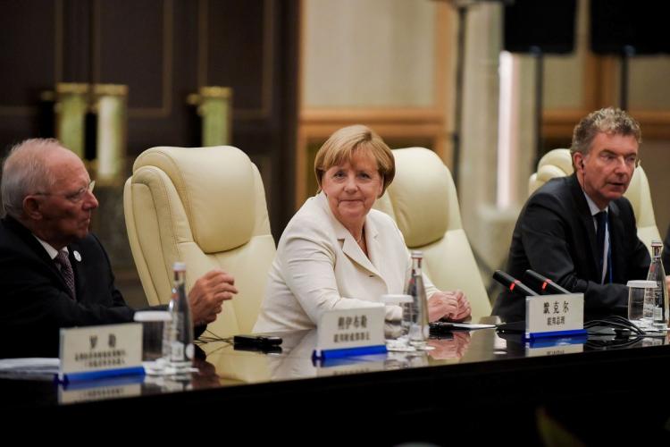 German Chancellor Angela Merkel looks on after her meeting with Chinese President Xi Jinping at the West Lake State House on the sidelines of the G20 Summit