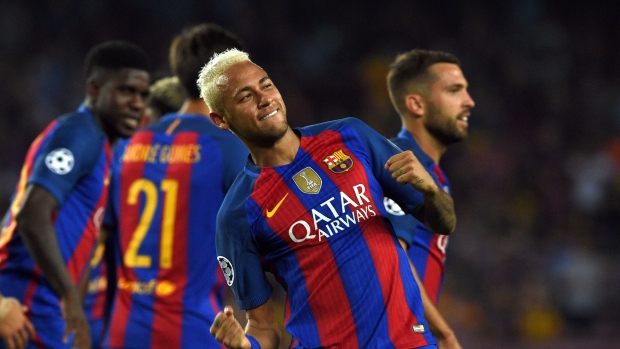 Barcelona's Brazilian forward Neymar celebrates after scoring against Celtic in Tuesday's Group C UEFA Champions League match