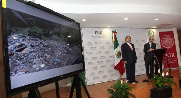 Mexico's Attorney General Jesus Murillo Karam right flanked by Tomas Zeron during a news conference discussing the case in 2014