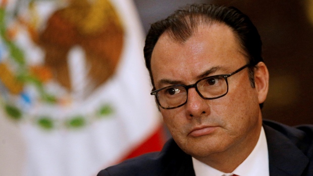 Mexico's President Enrique Pena Nieto has replaced finance minister Luis Videgaray seen here at a June news conference with former finance minister Jose Antonio Meade